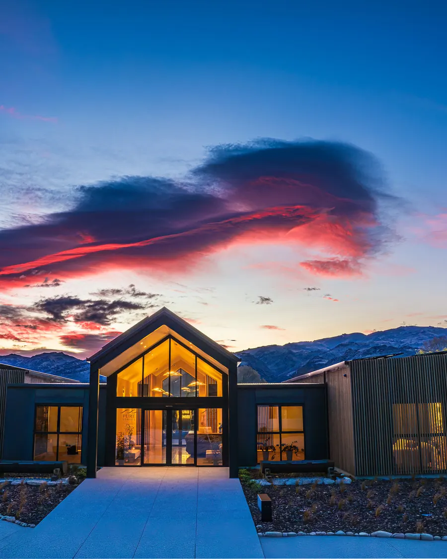 Pure Senses day spa at Mount Pisa near Cromwell, lit from inside at dawn